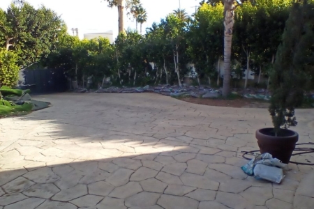 Fully gated parking / storage space in 44' × 23' driveway
