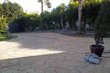 Fully gated parking / storage space in 44' × 23' driveway